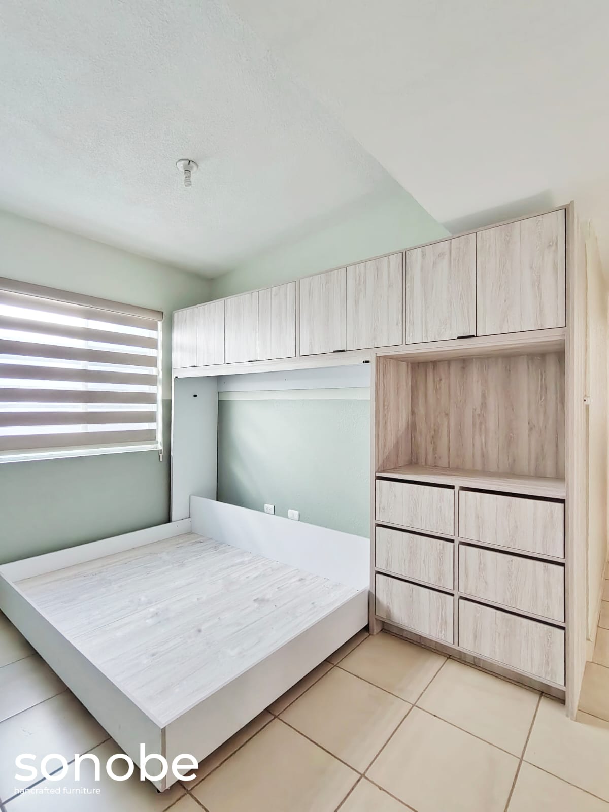 light oak bedroom suite — platform bed and built-in wardrobe