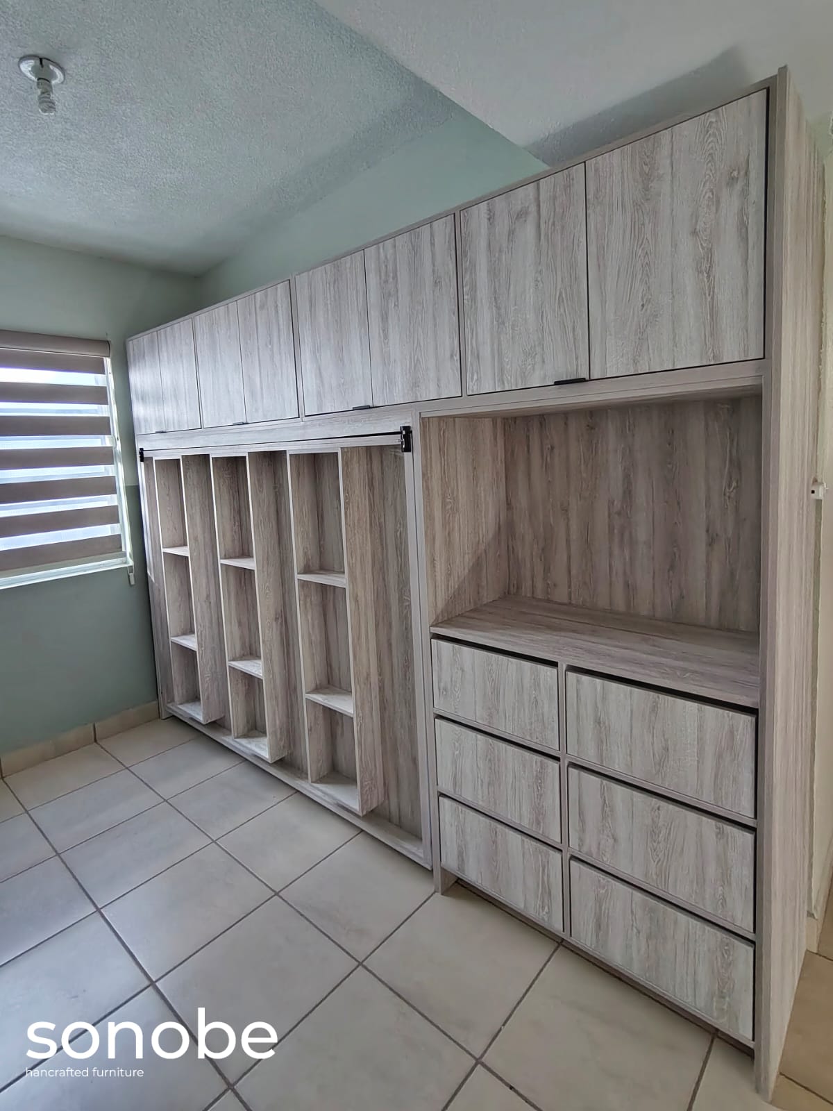 light oak bedroom suite — open wardrobe with shelving and drawers