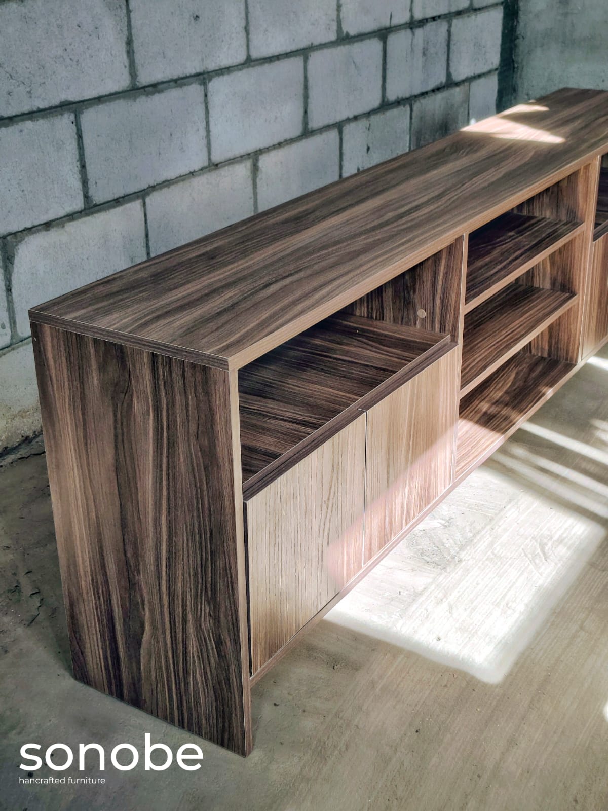 walnut credenza i — angled view with open shelving